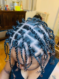 a woman with braids in her hair